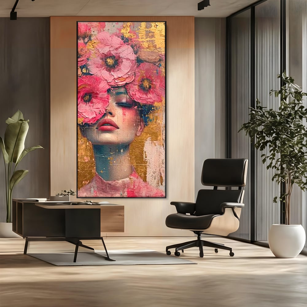 Tablou canvas cu tablou canvas cu portret de femeie si flori roz, in rama de aluminiu negru, pe perete intr-un birou